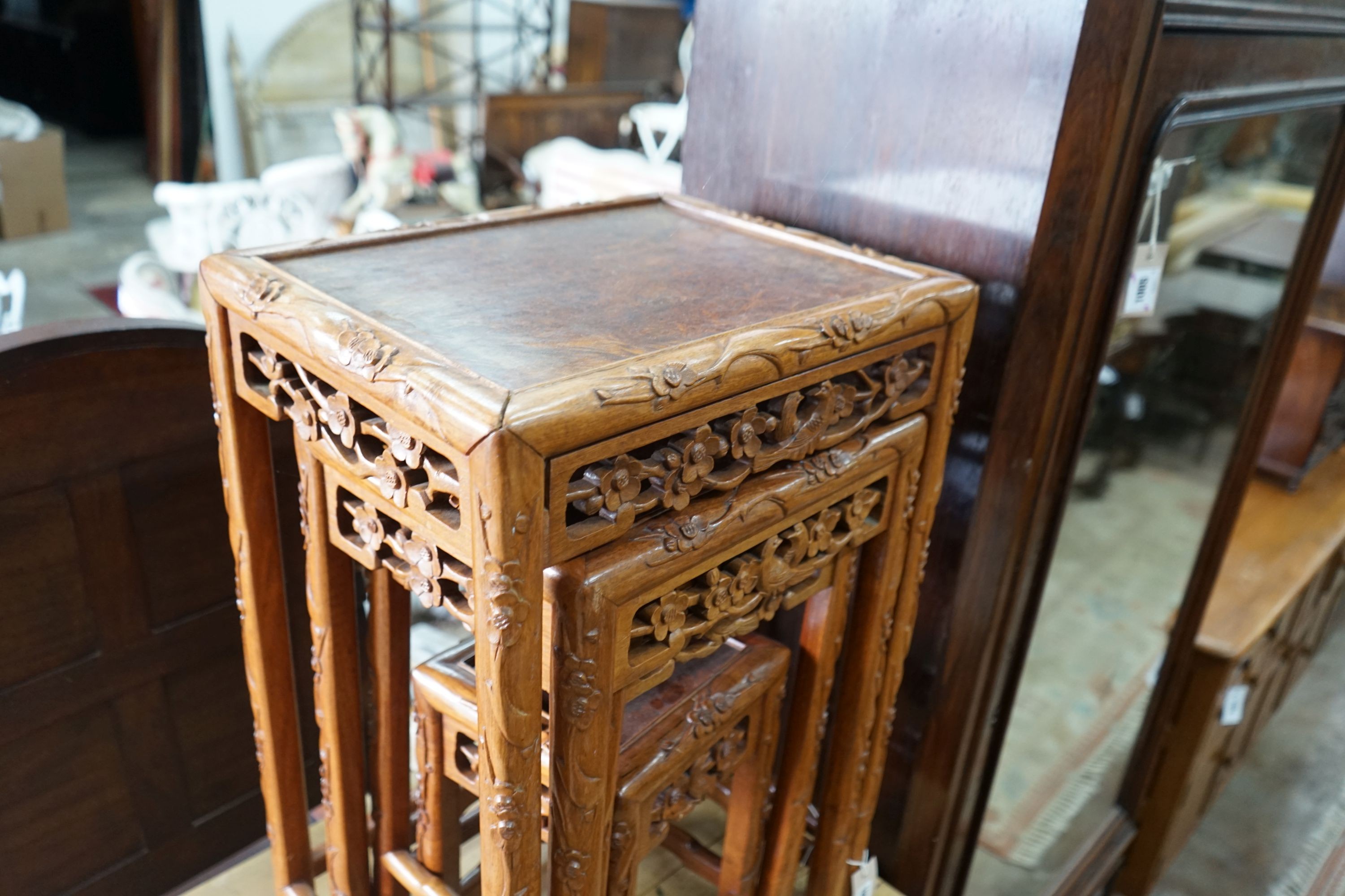 A quartetto of Chinese carved hardwood tea tables, width 46cm, depth 36cm, height 68cm
